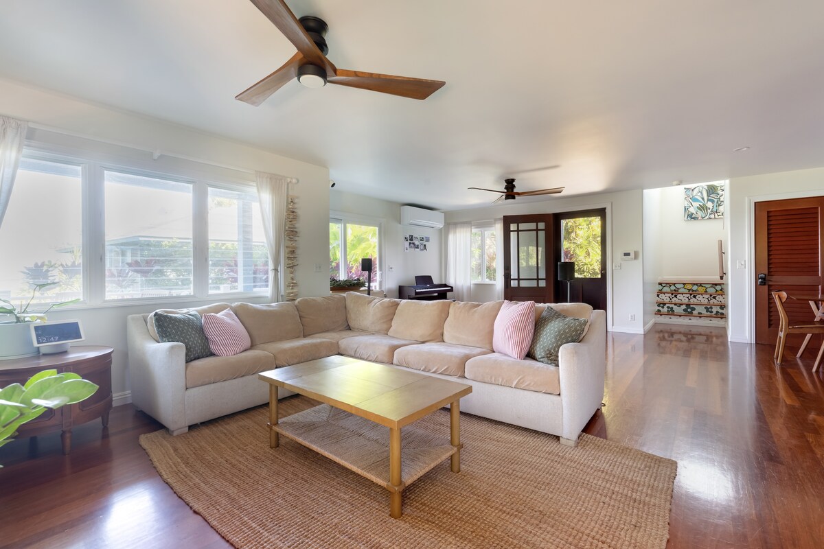 The Main House living area with comfortable seating at La'au Paina