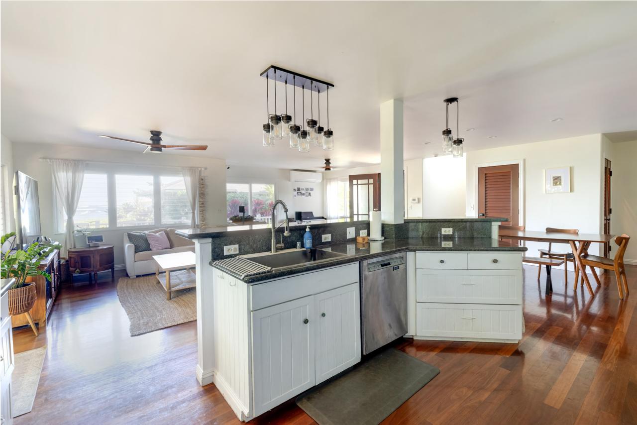 Open kitchen, dining, and living area in The Main House