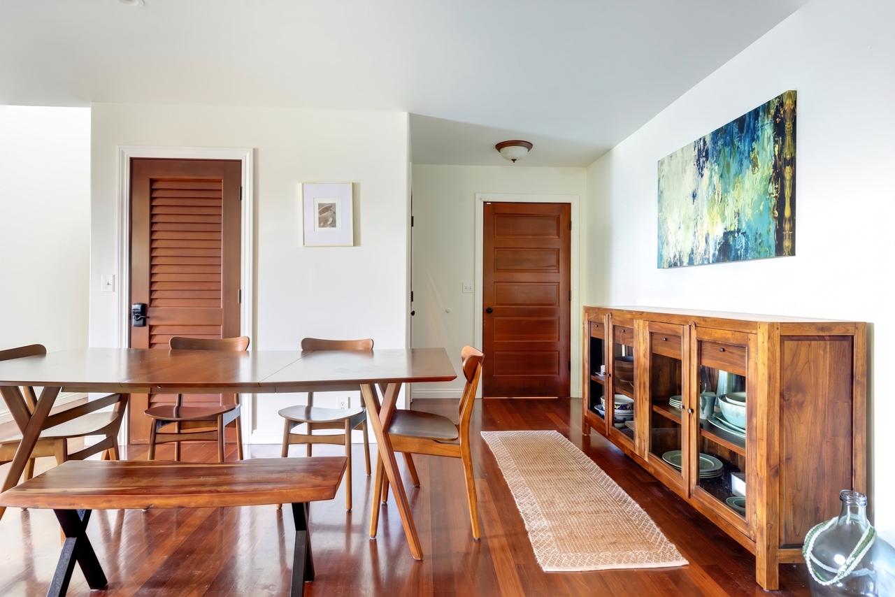 The Main House dining area with wooden table and sideboard