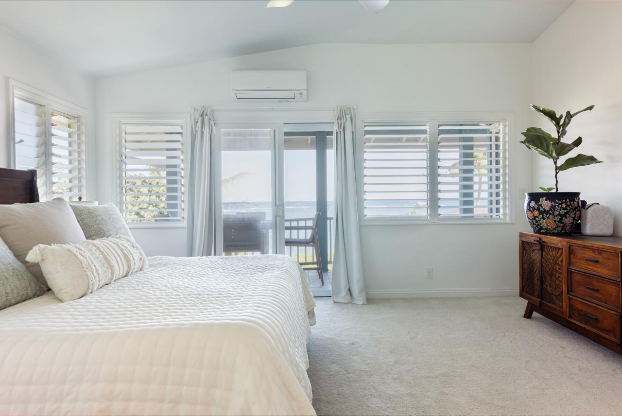 Bright ocean-view bedroom in The Main House