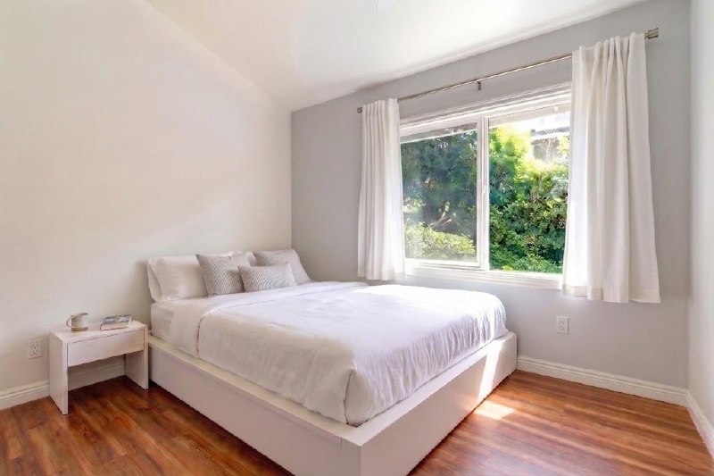 Bright garden-view bedroom in The Main House